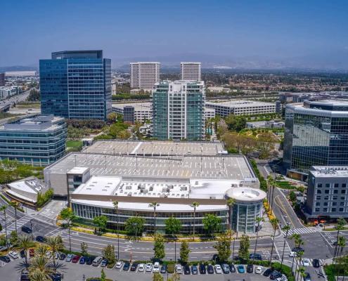 https://calitgroup.com/wp-content/uploads/2024/03/Low-Altitude-Aerial-View-of-Downtown-Irvine-California-in-Spring.jpg